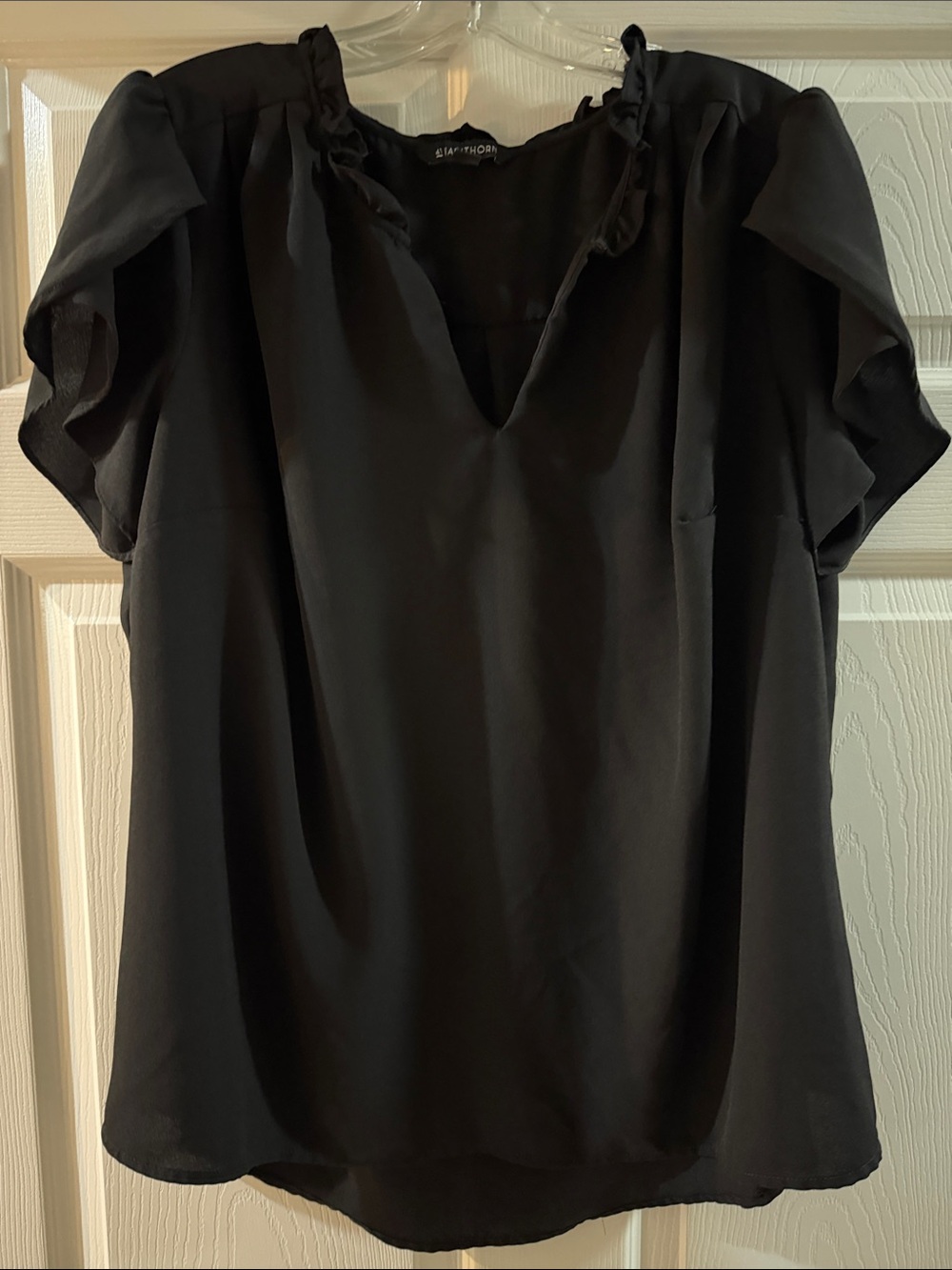 41 Hawthorn Black Ruffle V-Neck Blouse